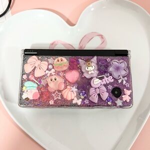 Nintendo DSI with preinstalled games and a case Works great